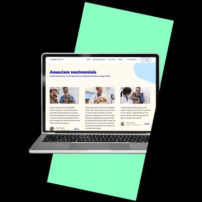 Laptop displaying an associate testimonials webpage, representing digital development and user experience services.